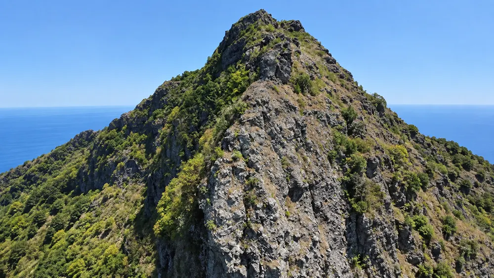 The rocky summit ridge of Le Morne Brabant above the ocean